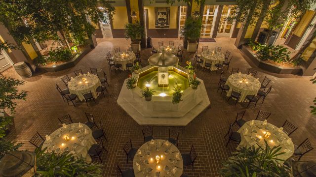 A dining area with a fountain in the center